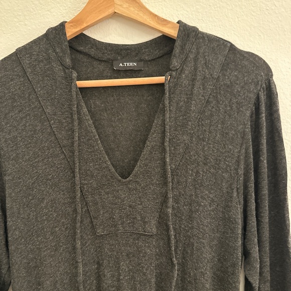 Dark grey maxi dress with V-neckline and long sleeves. Stretchy with movement - Picture 8 of 9